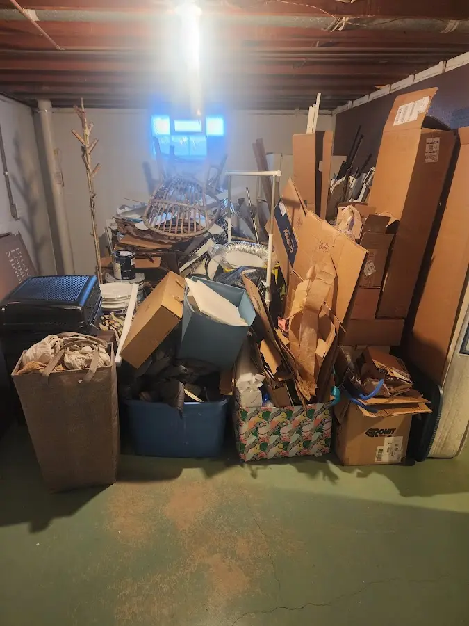 Roll-off dumpster container at job site for 15 Yard Dumpster Rental in Clifton Forge